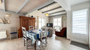 Jolie villa de plain-pied avec jardin et parking